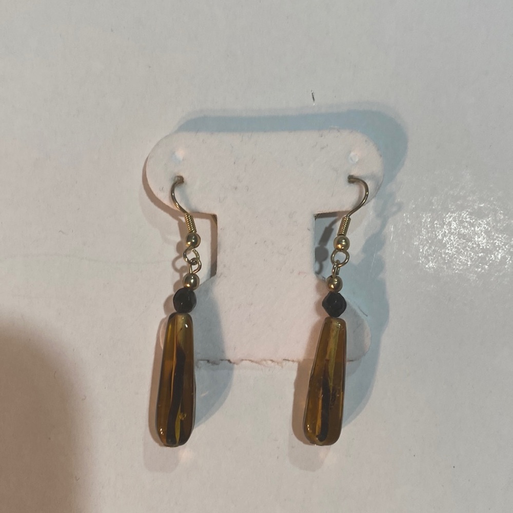 Brown earrings with gold finish